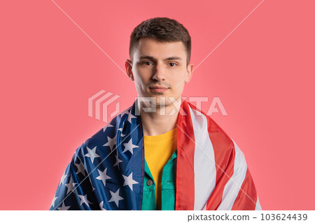 Happy young man with national USA flag. American patriot, 4th of July 103624439