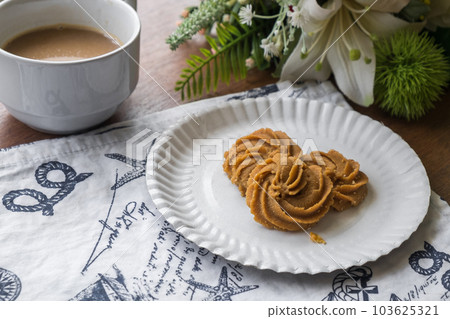 Fresh Homemade Cookie on the Table, Traditional Crispy Crunchy Snack with Coffee 103625321
