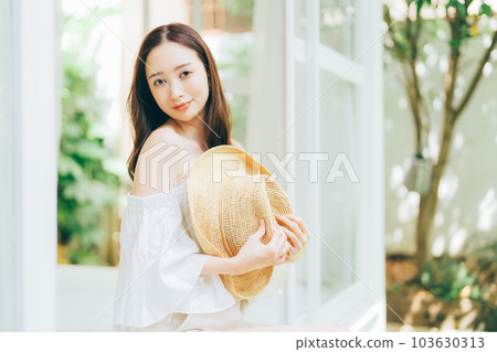 Young woman in summer clothes Young woman in summer clothes 103630313