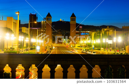Barcelona cityscape in twilight wth Avinguda de la Reina Maria Cristina 103631564