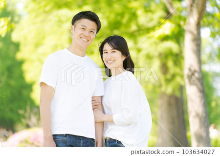 Photo of a young man and woman cuddling Photo of a young man and woman cuddling 103634027