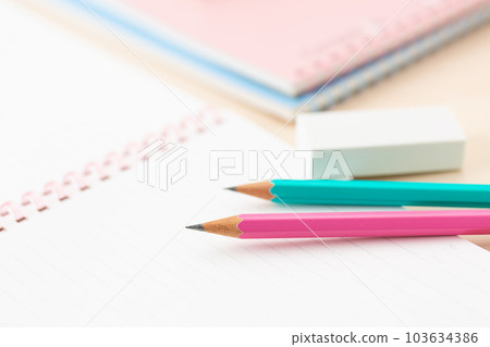 Notebook and pencil (stationery) 103634386