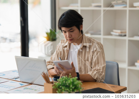 Accountant man working on laptop and do document, tax, exchange, research, accounting and Financial advisor concept 103635203