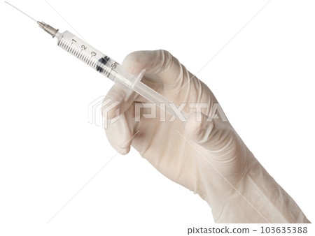 Syringe medical injection in hand. 103635388