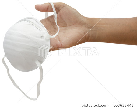 Hand holding medical mask. 103635445