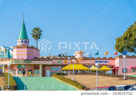 An amusement park (entrance) (attraction) view from the parking lot with the blue sky in the background "Mitsui Greenland" 103635702