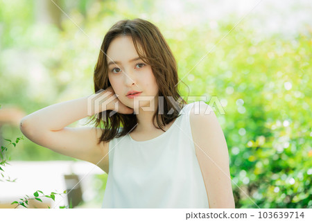 Fresh green white sleeveless woman 103639714