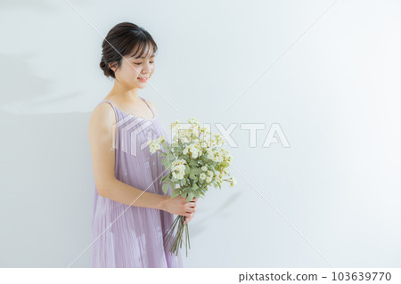 Woman with a bouquet 103639770