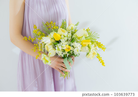 Woman with a bouquet 103639773