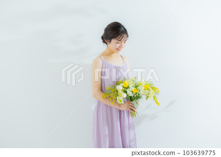 Woman with a bouquet 103639775