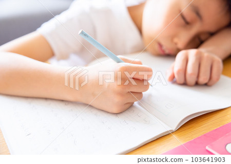 mother watching her child study 103641903