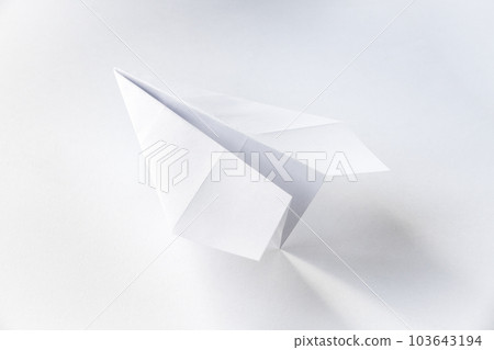 Paper plane origami isolated on a white background 103643194