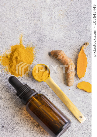 Turmeric roots background 103643449