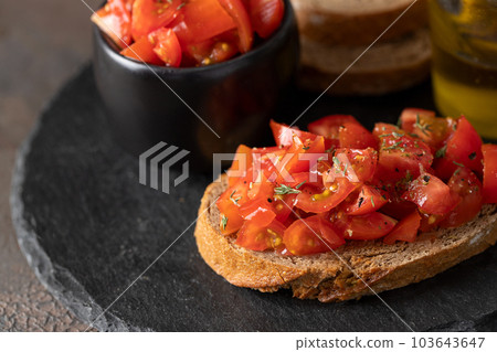 Bruschetta starter with tomato 103643647