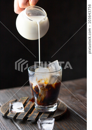 Summer time coffee with ice 103643756