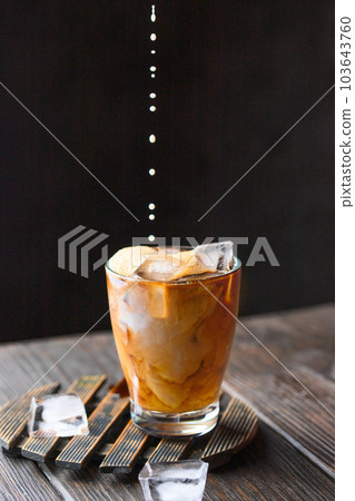 Summer time coffee with ice 103643760