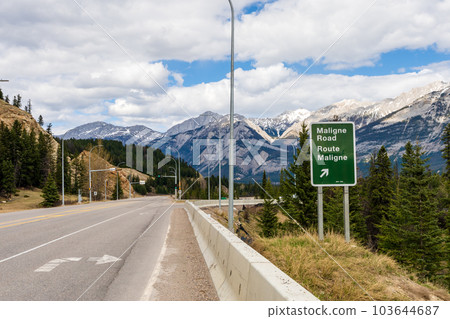 Alberta, Canada - May 11 2021 : Yellowhead Highway, Maligne Lake Rd, Road Sign. Jasper National Park. Alberta, Canada - May 11 2021 : Yellowhead Highway, Maligne Lake Rd, Road Sign. Jasper National Park. 103644687