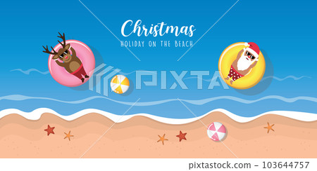 cute santa claus and deer relaxing on float ring in water on the beach 103644757