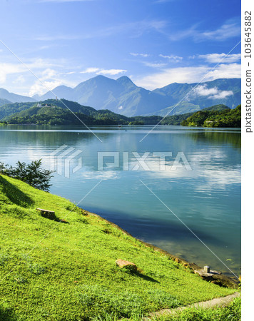 The scenery of Sun Moon Lake in the morning. it's a famous attraction in Nantou, Taiwan. The scenery of Sun Moon Lake in the morning. it's a famous attraction in Nantou, Taiwan. 103645882