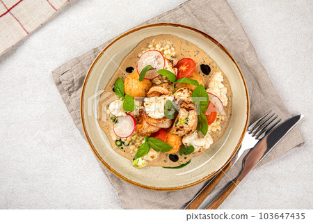 Portion of dish with ptitim and seafood Portion of dish with ptitim and seafood 103647435