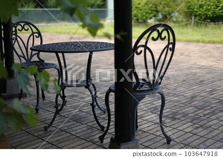 Chairs and tables on the cafe terrace 103647918