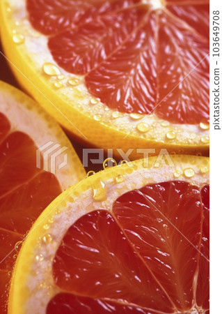 Close-up of a cross section of a cut grapefruit "AI-generated image" Close-up of a cross section of a cut grapefruit "AI-generated image" 103649708