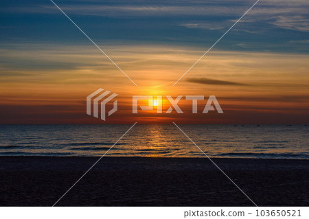 Spectacular bright golden sunset over Baltic sea Spectacular bright golden sunset over Baltic sea 103650521