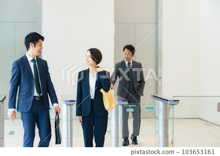 Group of business people having a conversation in the lobby 103653161