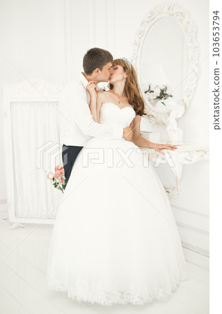 Wedding couple bride and groom holding hands 103653794