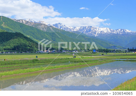 Hakuba village Northern Alps in early summer seen from the foot of the mountain Hakuba village Northern Alps in early summer seen from the foot of the mountain 103654065