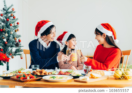 young family at christmas young family at christmas 103655557