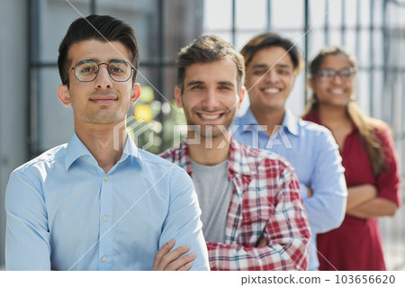 Successful business team while standing in the office 103656620