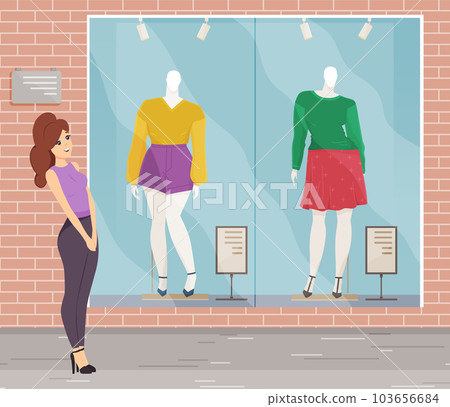 Cute girl choosing clothes on mannequin at front shop window. Woman standing near showcase in mall 103656684