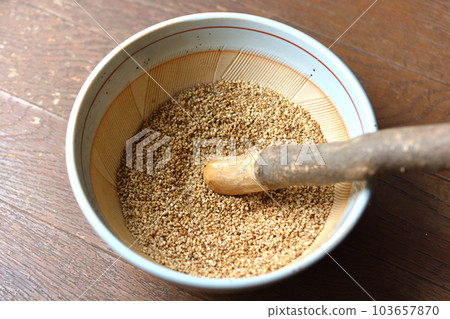 Ground sesame in a mortar Ground sesame in a mortar 103657870