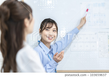 young woman giving a presentation 103659637