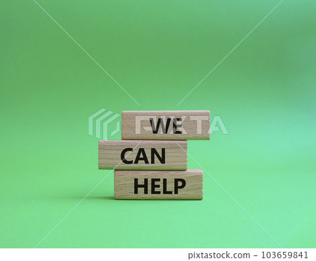 We can help symbol. Wooden blocks with words We can help. Beautiful green background. Business and We can help concept. Copy space. 103659841