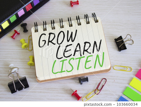 Grow Learn Listen symbol. Concept words Grow Learn Listen on white notebook. Beautiful wooden background. Business and Grow Learn Listen concept. Copy space Grow Learn Listen symbol. Concept words Grow Learn Listen on white notebook. Beautiful wooden background. Business and Grow Learn Listen concept. Copy space 103660034