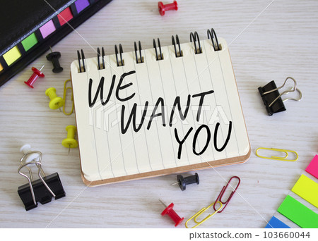We want you symbol. Concept words We want you on white notebook. Beautiful wooden background. Business and We want you concept. Copy space. 103660044
