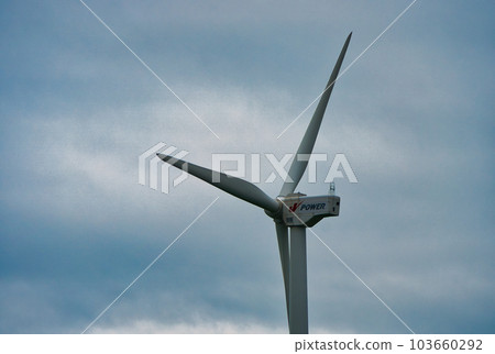 Photo of cloudy sky and wind power generation Photo of cloudy sky and wind power generation 103660292