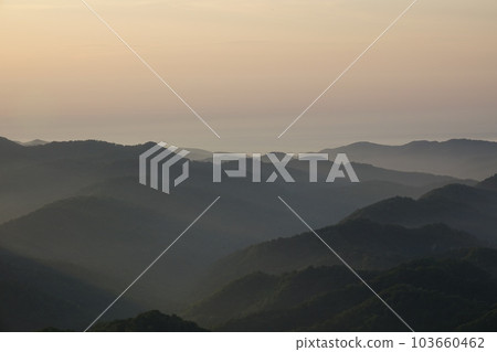 Mountains at dusk 103660462