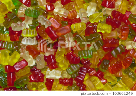 Gummies that fill the screen, horizontal position, I want to swim in a pool of lots of gummies 103661249
