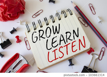 Grow Learn Listen symbol. Concept words Grow Learn Listen on white notebook. Beautiful white background. Business and Grow Learn Listen concept. Copy space 103661314