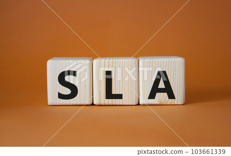 Premium Photo  Letters of the alphabet of sla on wooden cubes green plant  white background sla short for service level agreement