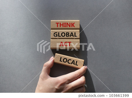 Think global act local symbol. Wooden blocks with words Think global act local . Beautiful grey background. Businessman hand. Business and Think global act local concept. Copy space. 103661399