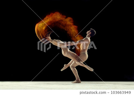 Support. Young graceful ballet dancers, man and woman ion beige bodysuits dancing with powder explosion against black studio background 103663949