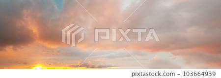 Brigth red and golden sunset sky with clouds and yellow twilight, heaven landscape background 103664939