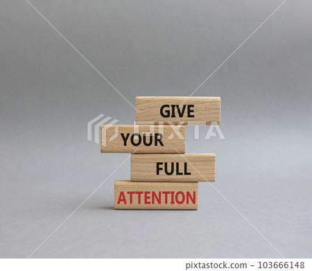 Give your full Attention symbol. Concept word Give your full Attention on wooden blocks. Beautiful grey background. Business and Give your full Attention concept. Copy space Give your full Attention symbol. Concept word Give your full Attention on wooden blocks. Beautiful grey background. Business and Give your full Attention concept. Copy space 103666148