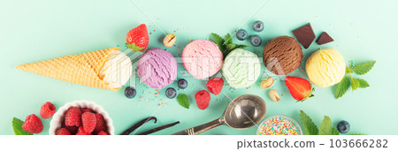 Flying ice cream balls and ingredients on pastel light blue background Flying ice cream balls and ingredients on pastel light blue background 103666282
