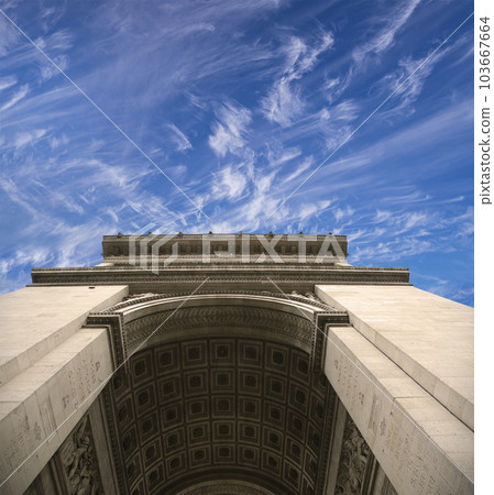 Arc de Triomphe (against the background of sky with clouds), Paris, France. The walls of the arch are engraved with the names of 128 battles and names of 660 French military leaders (in French) Arc de Triomphe (against the background of sky with clouds), Paris, France. The walls of the arch are engraved with the names of 128 battles and names of 660 French military leaders (in French) 103667664