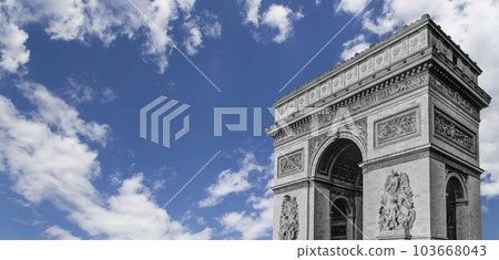 Arc de Triomphe (against the background of sky with clouds), Paris, France. The walls of the arch are engraved with the names of 128 battles and names of 660 French military leaders (in French) Arc de Triomphe (against the background of sky with clouds), Paris, France. The walls of the arch are engraved with the names of 128 battles and names of 660 French military leaders (in French) 103668043